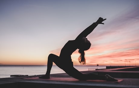 Person stretching on a mat